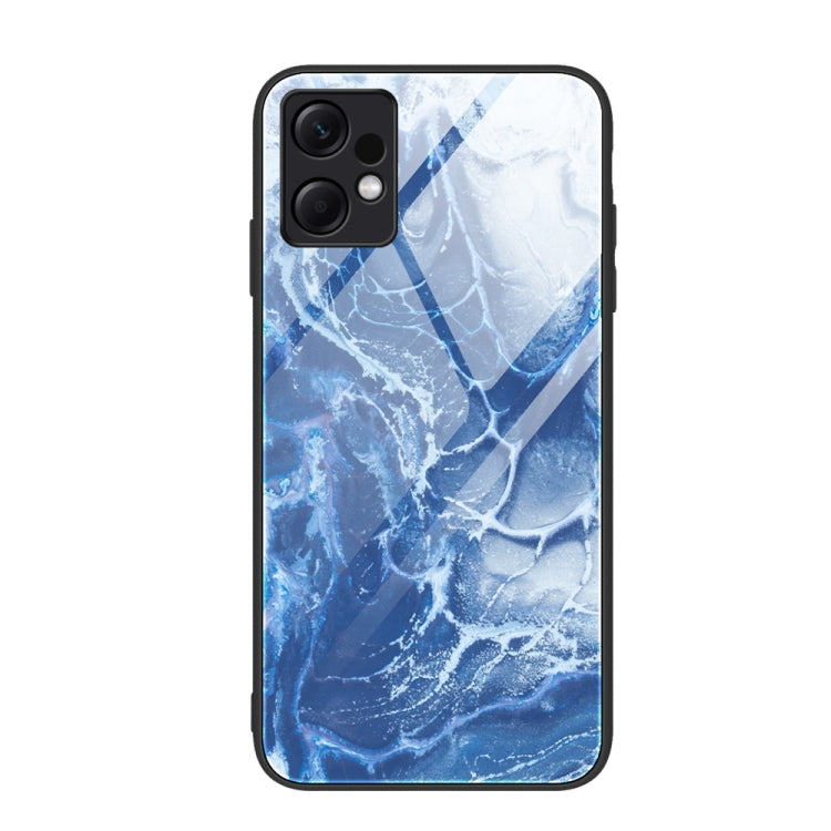 Glass protective phone case with blue marble crackle and wave patterns
