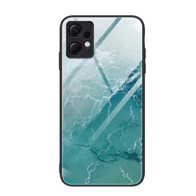 Glass protective phone case with teal marble veining and watery texture