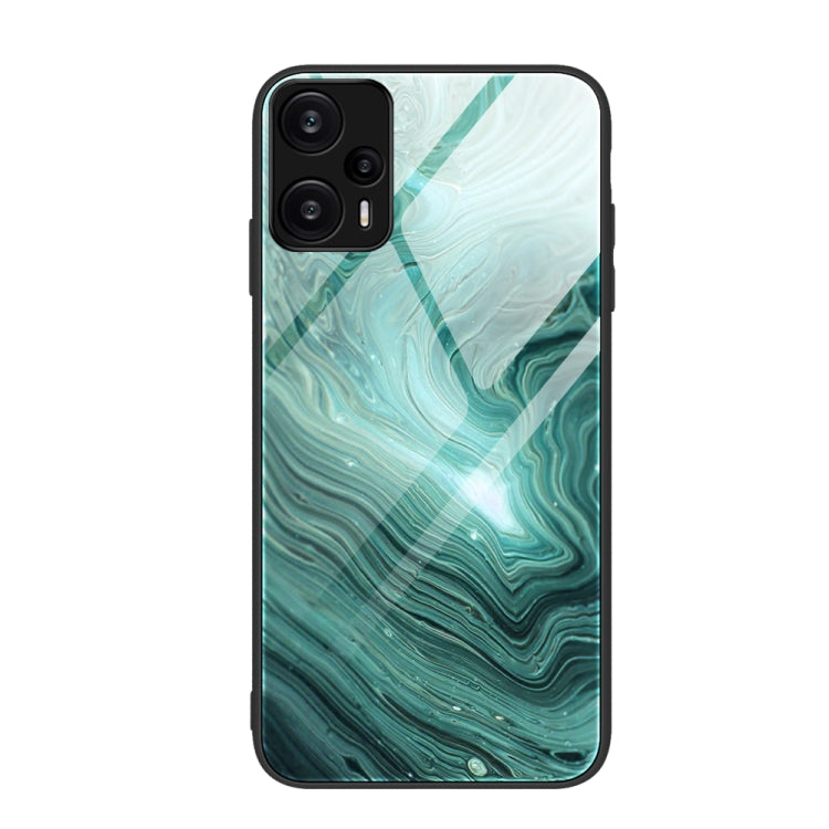 Glass protective phone case with teal-green marble wave lines and swirls