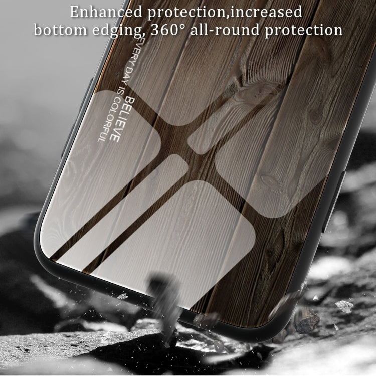 Dark wood grain TPU phone case with raised edges and camera cutout