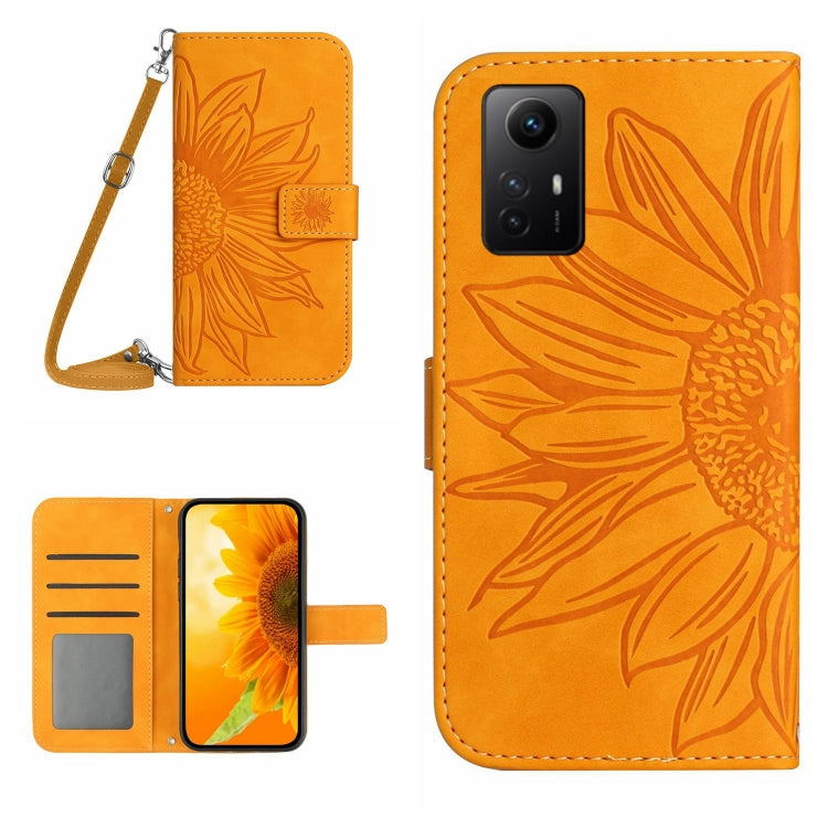 Embossed sunflower flip phone case with lanyard, orange faux leather, card slots