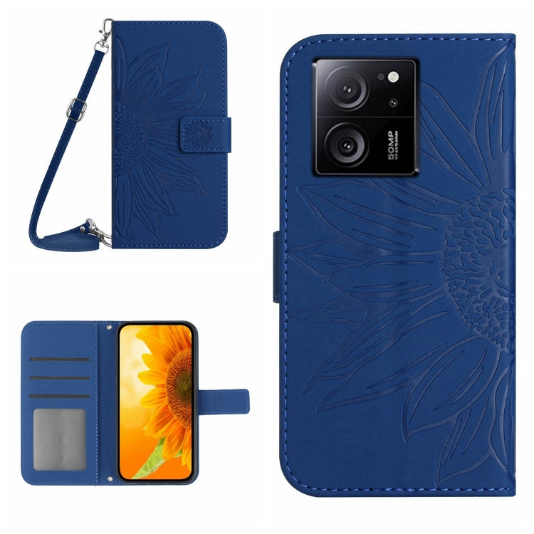 Blue embossed flower flip leather phone case with lanyard, card slots, and magnetic flap