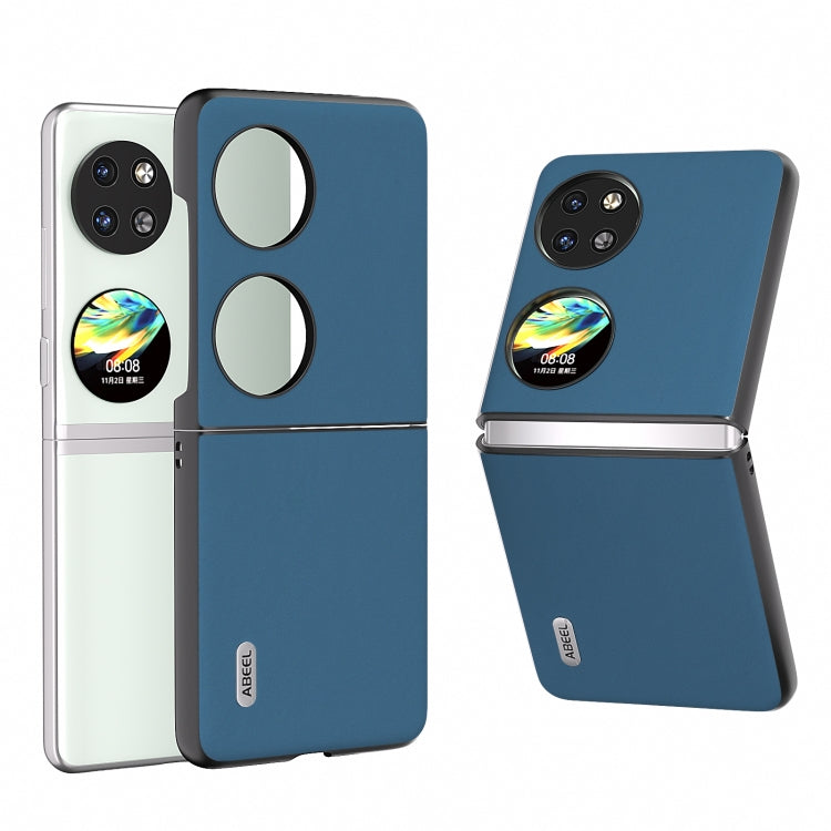 Blue genuine leather folding phone case with camera cutouts and hinge for foldables.