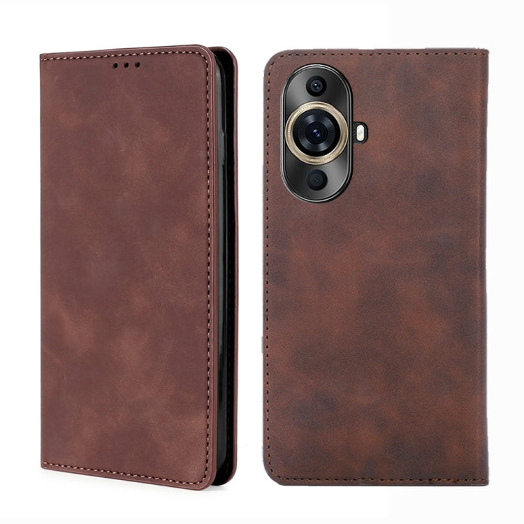 Dark brown magnetic leather phone case with stitched edges and camera cutout