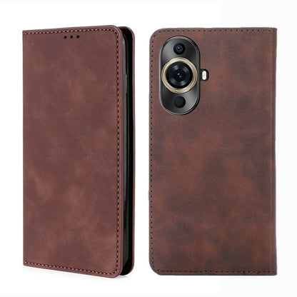 Dark brown magnetic leather phone case with stitched edges and camera cutout