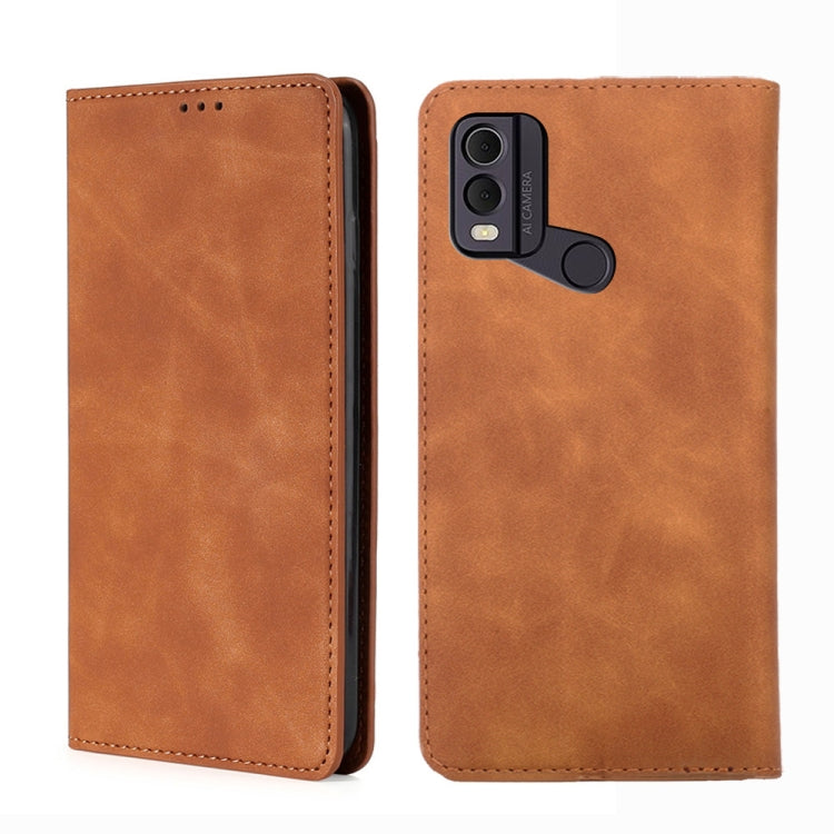 Tan leather phone case with front speaker cutout and camera opening with ring detail