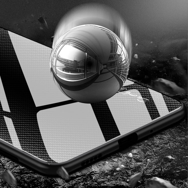 Black TPU phone case with raised edges and carbon-fiber texture pattern for phone protection.
