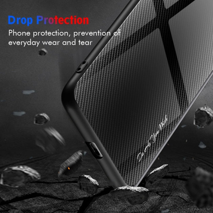 Black carbon-fiber texture TPU phone case with drop protection and secure side cutouts.