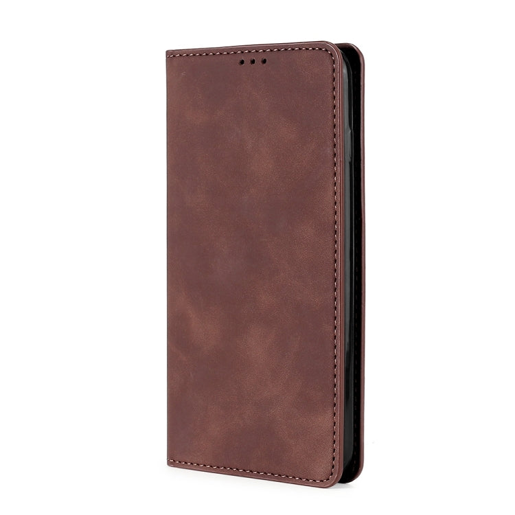 Dark brown leather folio phone case, slim profile, stitched border and speaker cutouts