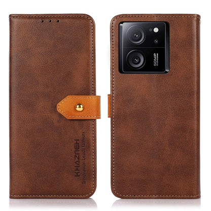 Brown leather flip phone case with camera cutout and magnetic strap