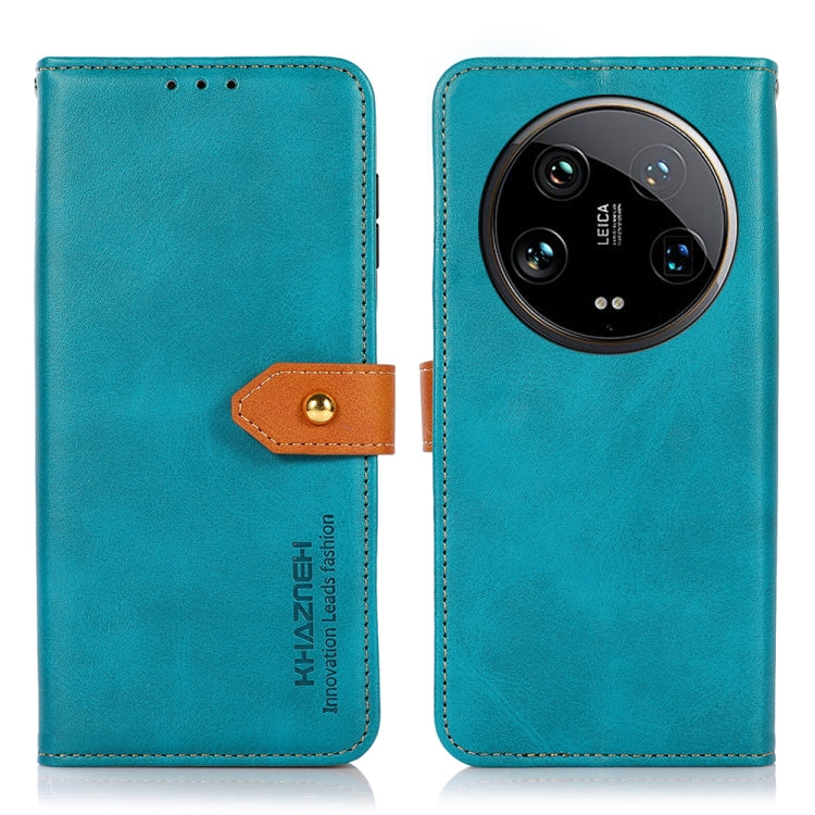 Teal leather flip phone case with tan clasp and camera cutout
