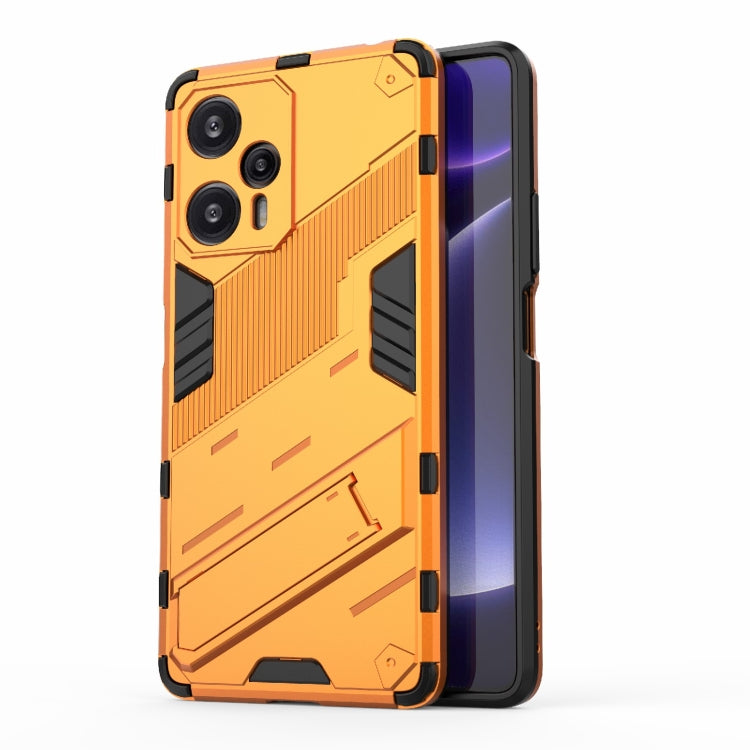 Armored phone case with orange hard shell and black grip panels, side profile visible