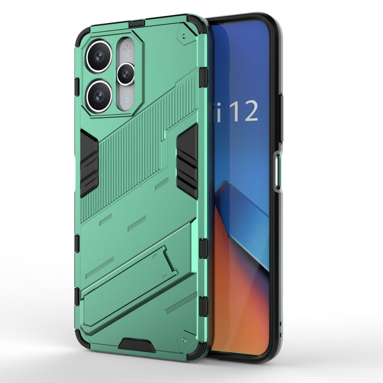 Punk armor phone case with rugged ribbed design and raised edges, green/black