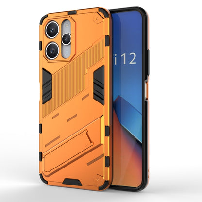 Punk armor phone case with rugged ribbed design and raised edges, orange/black