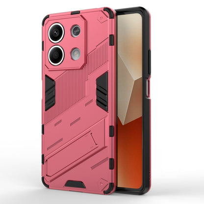 Pink rugged phone case with armor panel texture, raised camera openings, and impact bumpers.