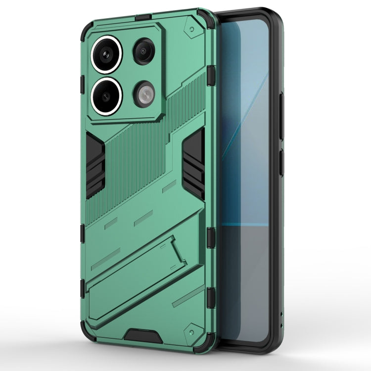 Green rugged phone case with armor ridges, raised camera cutouts, and protective bumper edges.