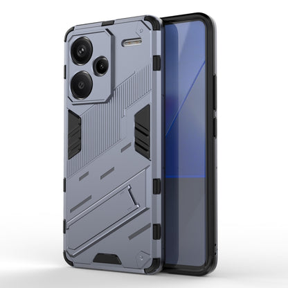 Grey rugged TPU phone case with textured armor design and raised camera protection.