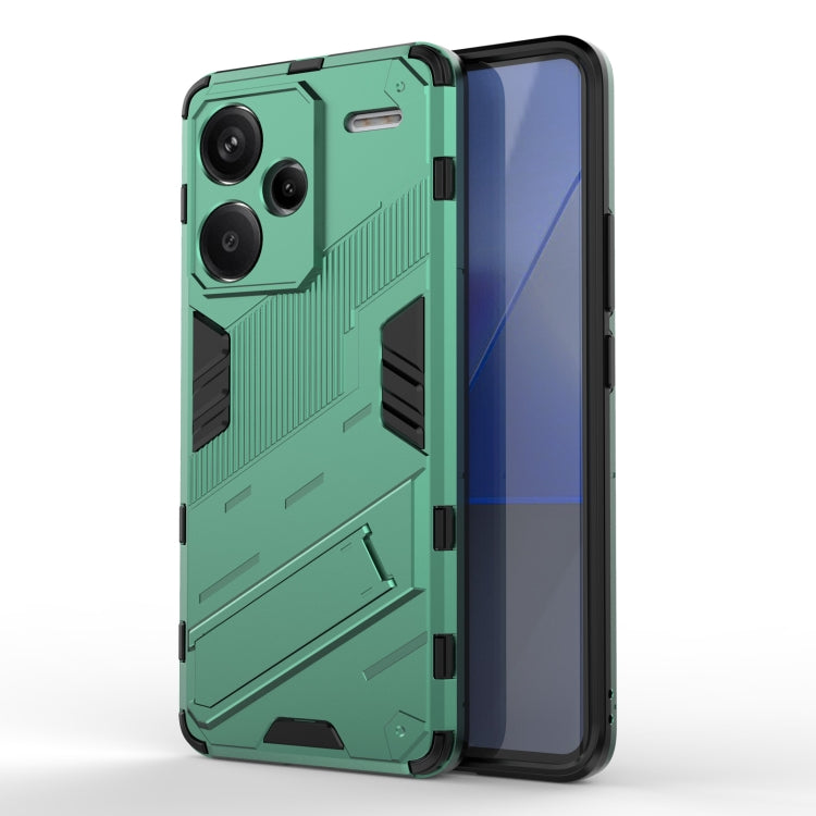 Green rugged TPU phone case with textured armor pattern and raised camera protection.
