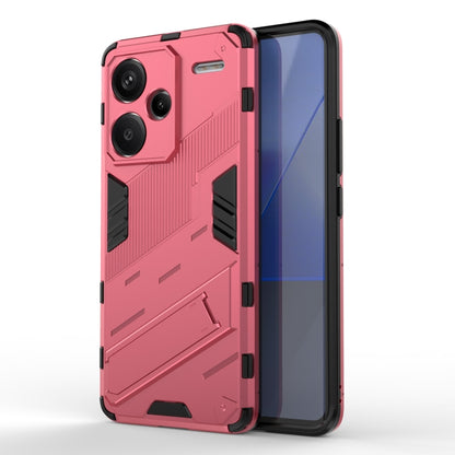 Light red rugged TPU phone case with textured armor pattern and raised camera protection.