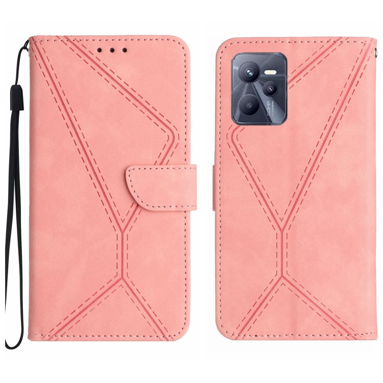 Pink embossed leather phone case with camera cutout, magnetic flap, wrist strap, card slot