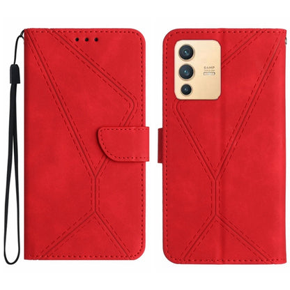 Red embossed leather-style phone case with stitched geometric pattern and wrist strap