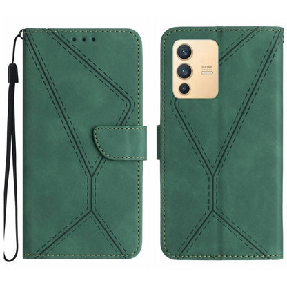 Green embossed leather-style phone case with stitched geometric pattern and wrist strap