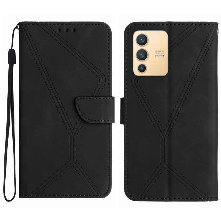 Black leather phone case with embossed stitching pattern and flip wallet flap