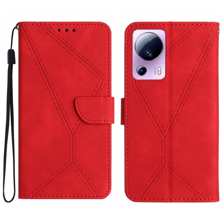 Red embossed leather phone case with stitching pattern and card flap, wrist strap loop