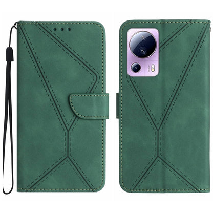 Green embossed leather phone case with stitching pattern and camera cutout, wrist strap loop