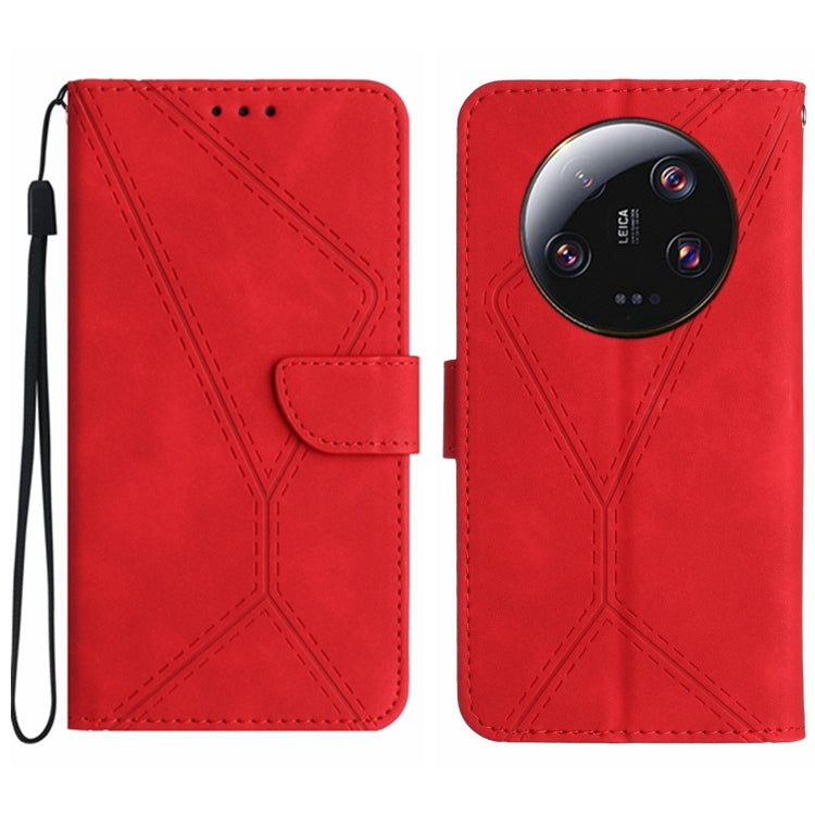 Red embossed leather flip phone case with stitched pattern and wrist strap loop