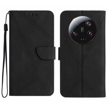 Black embossed leather phone case with stitched geometric pattern and wrist strap.