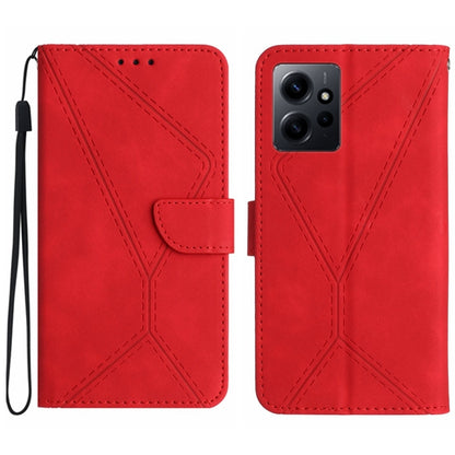 Red embossed leather phone case with stitched geometric pattern and wrist strap.