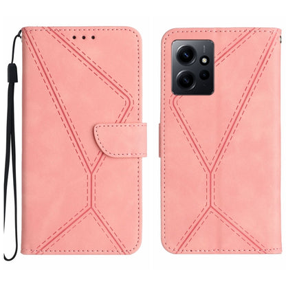 Pink embossed leather phone case with stitched geometric pattern and wrist strap.
