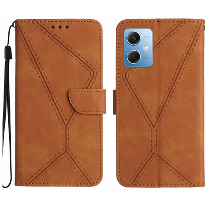 Brown embossed leather phone case with stitching pattern and card flap, wrist strap loop