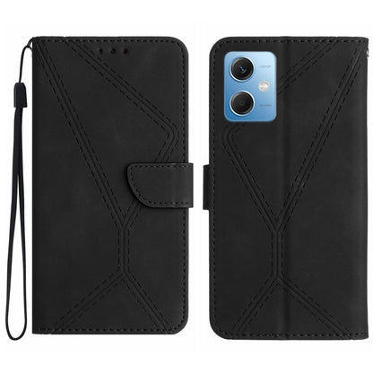 Black embossed leather phone case with stitching pattern and card flap, wrist strap loop