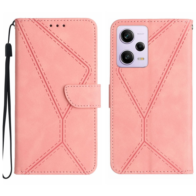 Pink leather phone case with stitched geometric embossing and flip pocket, wrist strap