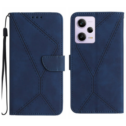 Blue leather phone case with stitched geometric embossing and flip pocket, wrist strap