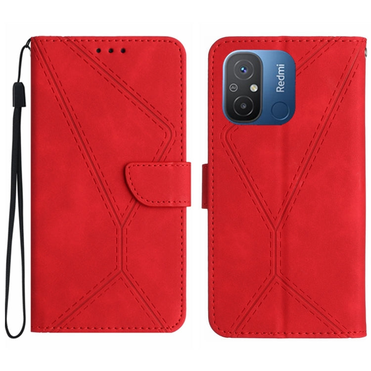 Red embossed leather wallet phone case with stitched geometric pattern and wrist strap