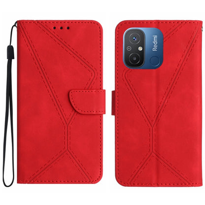 Red embossed leather wallet phone case with stitched geometric pattern and wrist strap