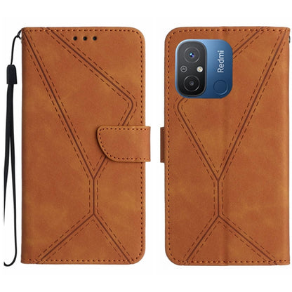 Brown embossed leather wallet phone case with stitched geometric pattern and wrist strap