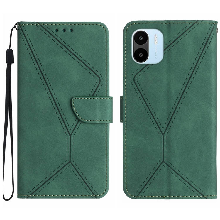 Green embossed leather wallet phone case with stitched geometric pattern and wrist strap