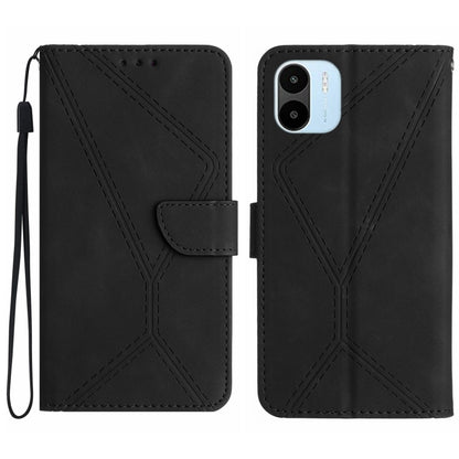 Black embossed leather wallet phone case with stitched geometric pattern and wrist strap