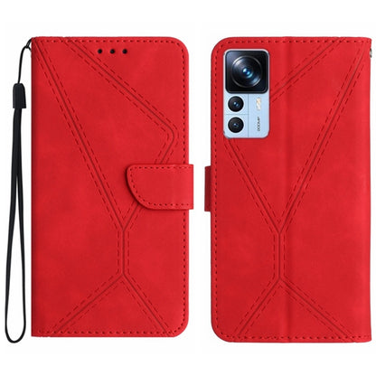 Red faux leather phone wallet case with embossed geometric stitching, flip flap, wrist strap.