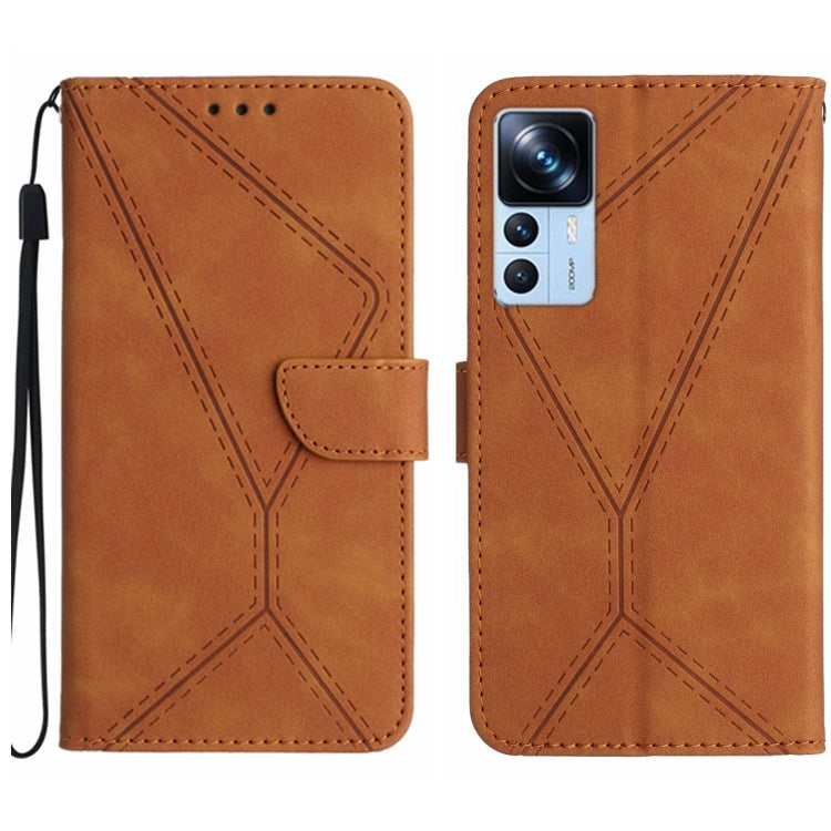 Brown faux leather phone wallet case with embossed geometric stitching, flip flap, wrist strap.
