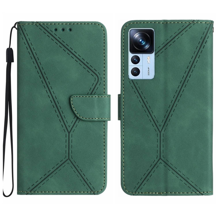 Green faux leather phone wallet case with embossed geometric stitching, flip flap, wrist strap.