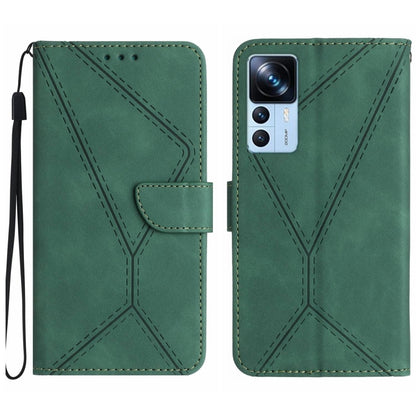 Green faux leather phone wallet case with embossed geometric stitching, flip flap, wrist strap.