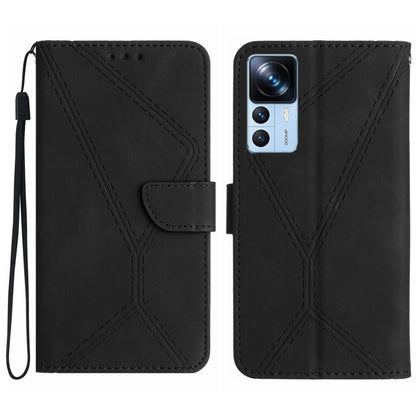 Black faux leather phone wallet case with embossed geometric stitching and front card pocket.