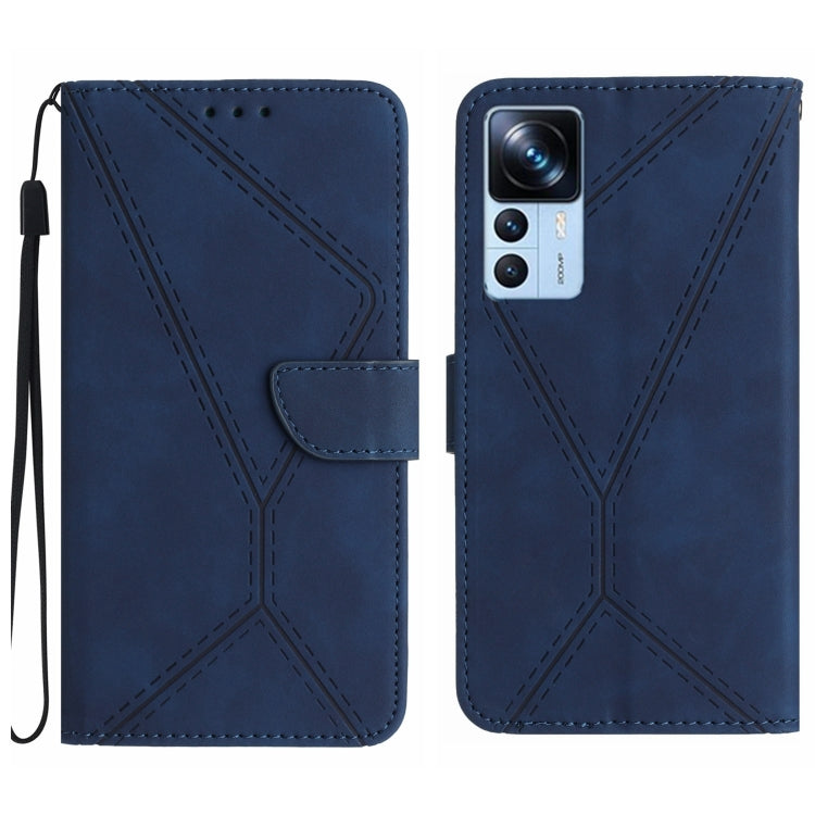 Blue faux leather phone wallet case with embossed geometric stitching and front card pocket.