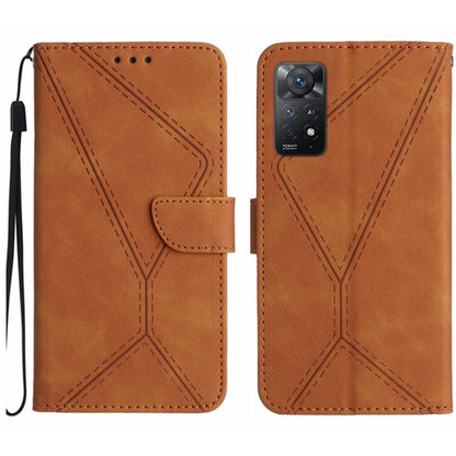 Brown leather wallet phone case with stitched geometric embossing and wrist strap