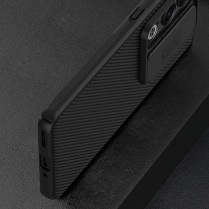 Black phone case with ridged grip sides and visible port cutouts.